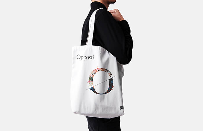 A-man-holding-a-tote-bag-high-demand-products-to-sell